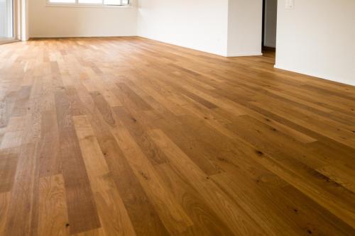 Wooden Parquet Floor In A New And Empty Apartment